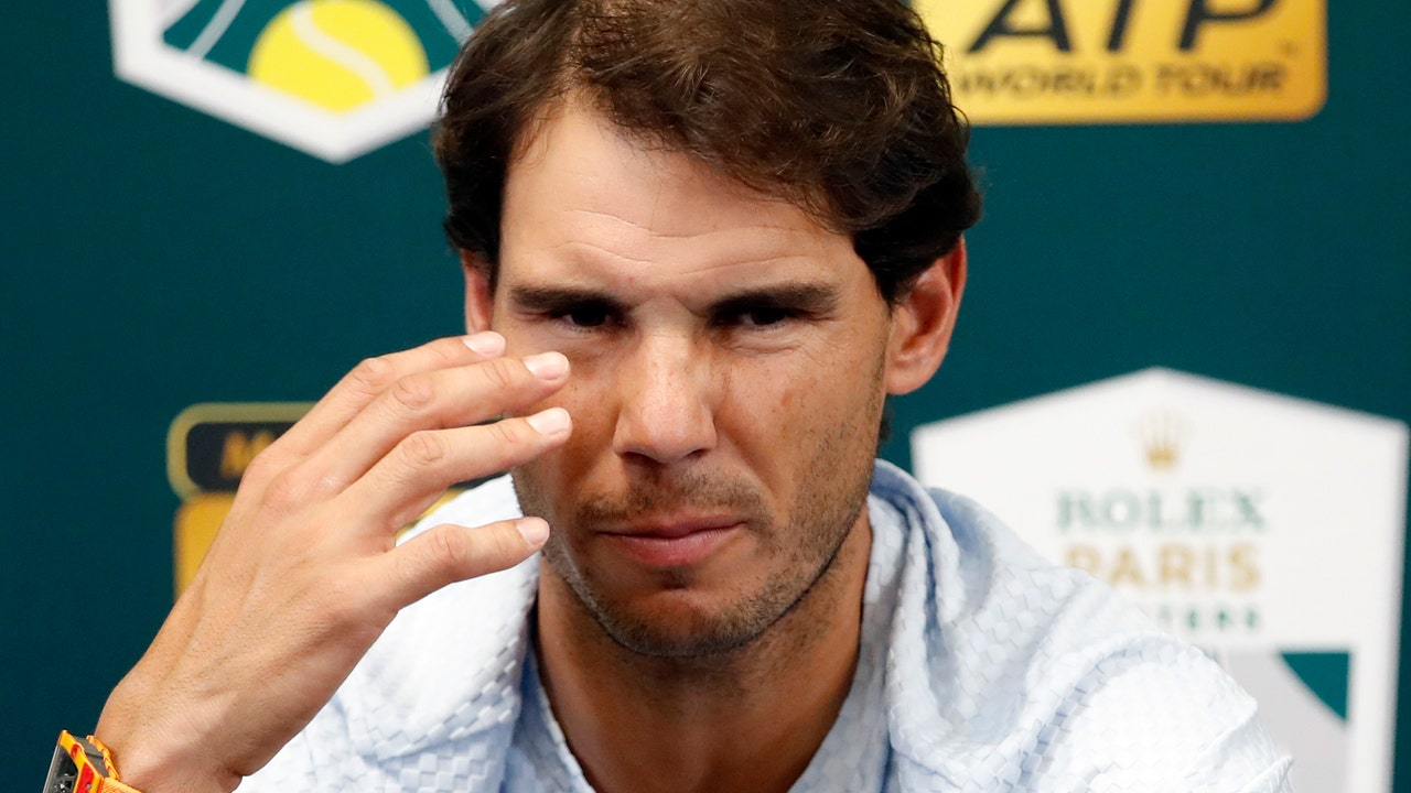 Rafael Nadal pulls out of Paris Masters with abdominal pain